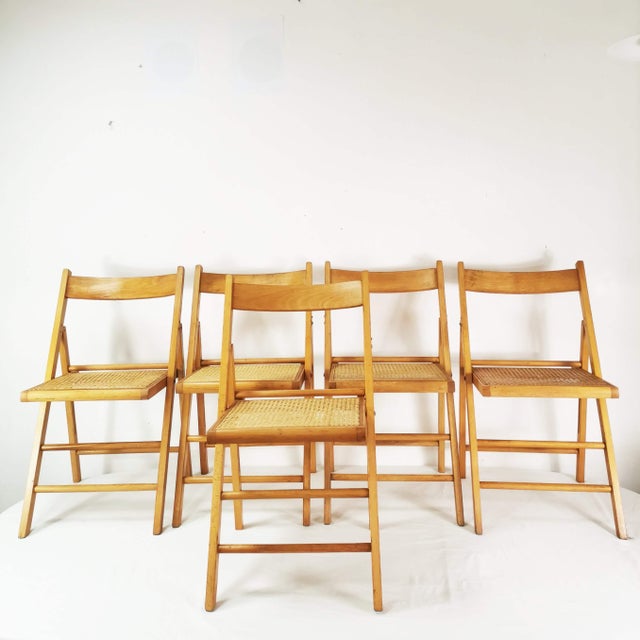 Set of 5 chairs with raffia, originating from Germany, 1980s. They are characterized by a spacious design and easy-to-use,...