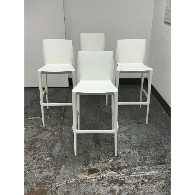 Design Plus Gallery presents a Set of Four of the Bellini Barstools by Mario and Claudio Bellini for Heller. The stools...