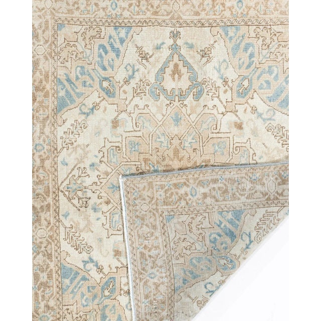 A beautiful hand-knotted rug, traditionally crafted by skilled artisans using fine-quality wool. The hand-knotted...