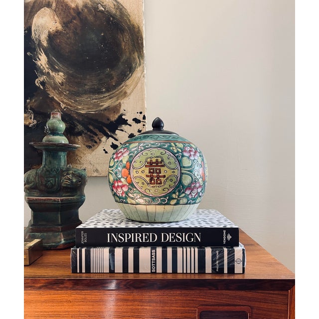 Fabulous old ginger jar, presented in a pattern of rich Green with a double happiness pattern that appears on all four...