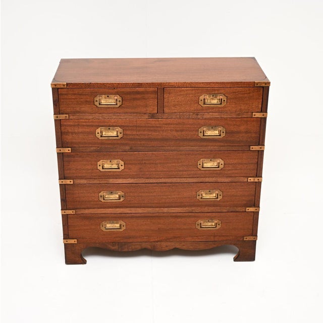A finely constructed and very smart antique military campaign style chest of drawers. This was made in England, it dates...