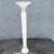 This postmodern torchiere floor lamp brings sculptural tropical elegance to any room. A tall tapered column in a textured...