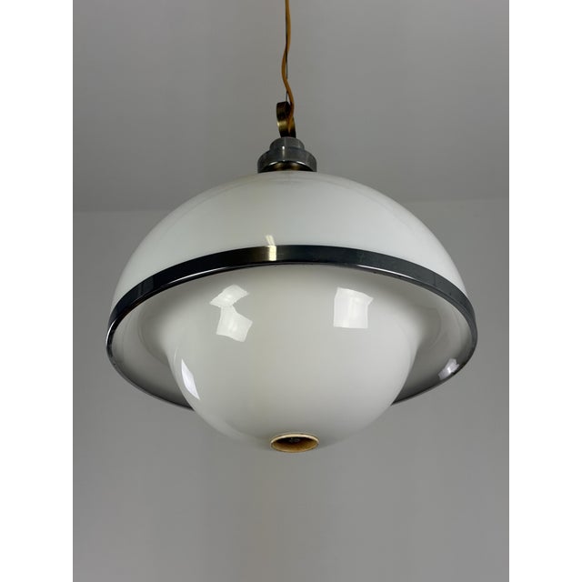 Large acrylic glass pendant lamp with three lights, 1960s Metal details. E14 bulbs. Complete and in good condition....