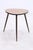 Vintage side table in a classic mid-century design with slender, tapered legs. The characteristic organic shape and warm...