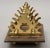Very unusual brass and gutta percha pen stand with acorn-shaped finials and feet. There are slots for eight pens. Gutta...