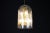 Iconic doria leuchten smoked glass and brass pendant light, germany, 1970s this exceptional ample pendant light was...