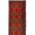 An early 20th Century Persian Kilim runner with multiple multicolored diamond medallions on a variegated crimson...