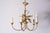 This stunning 20th-century French chandelier draws inspiration from the elegant designs of Maison Charles. The centerpiece...