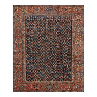 Antique Persian Bakshaish Rug in Navy Blue With Floral Patterns From Rug & Kilim For Sale