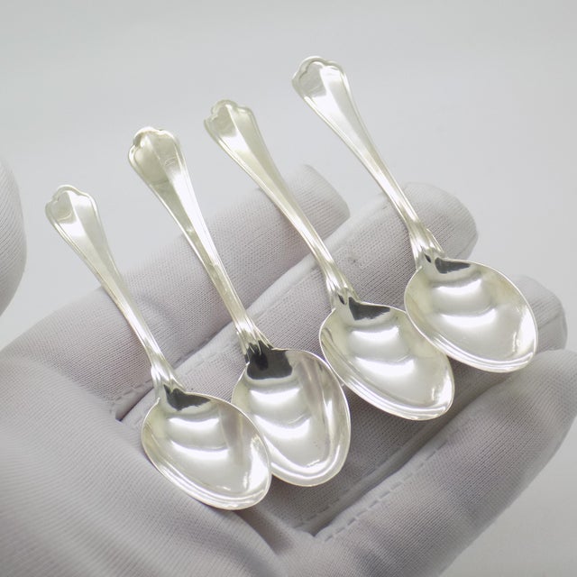 A refined vintage set composed of 4 sugar and espresso spoons, handmade in Continental Silver (800/000) in Sicily between...