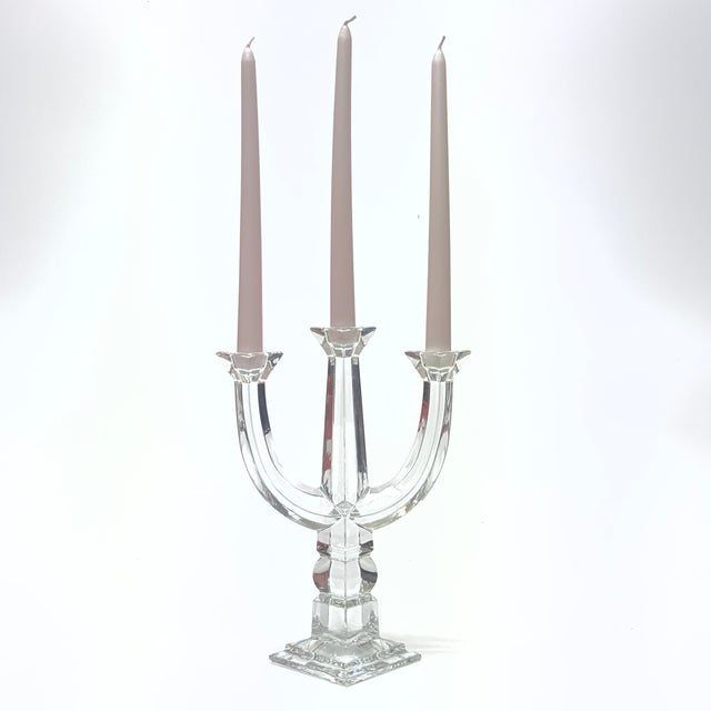 Crystal candelabra. This is an elegant Towle lead crystal candelabra crafted in Austria, featuring a sculptural three-arm...