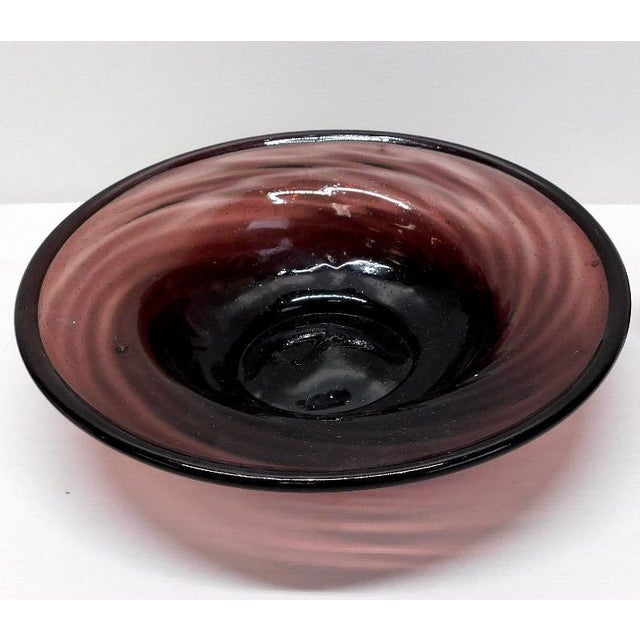Mid-Century Modern Hand-Blown Large Amethyst Glass Centerpiece Bowl This striking Mid-Century Modern centerpiece bowl is a...