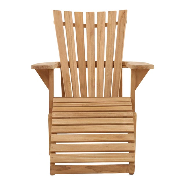 Hand crafted teak wood slatted outdoor lounge chair. Classic beach house style. Each will vary in natural wood grain,...