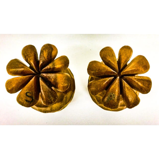 Unusual shape and vintage indeed. These salt and pepper shakers will add pizazzz to your table. I could not remove the...