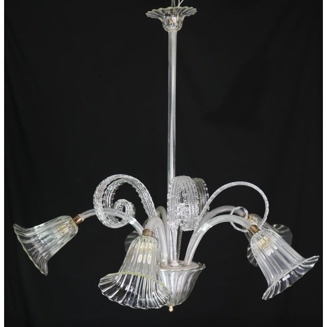 A wonderful Murano glass chandelier from the last century. In perfect vintage condition. The chandelier features 5...