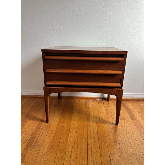Mid-Century Modern Lane Rhythm Series Nightstand. Mid-century modern walnut nightstand from Lane's Rhythm series features...