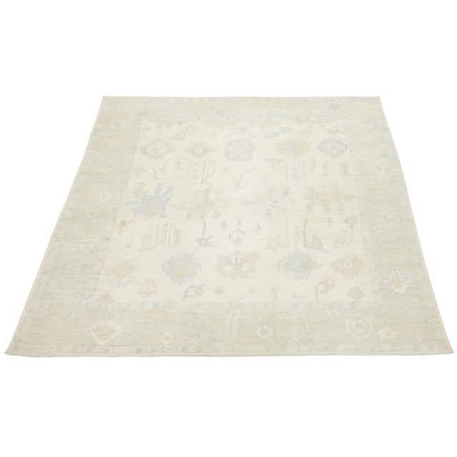 Transform your space with the elegance of this Modern Oushak style wool rug, hand-crafted to mimic antique Turkish...