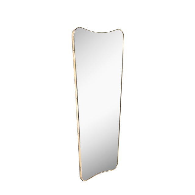 This exquisite Mid-Century Modernist mirror, crafted in Italy circa 1950, showcases a bold yet graceful design. The mirror...
