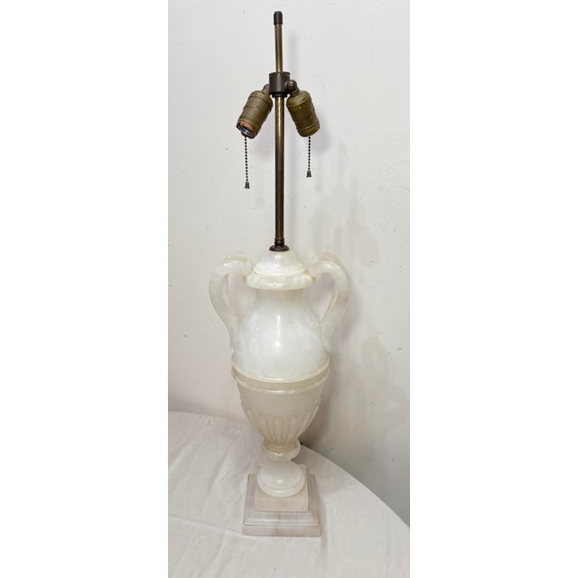Add a touch of elegance to your living space with this large antique hand-carved marble stone electric table lamp. Crafted...