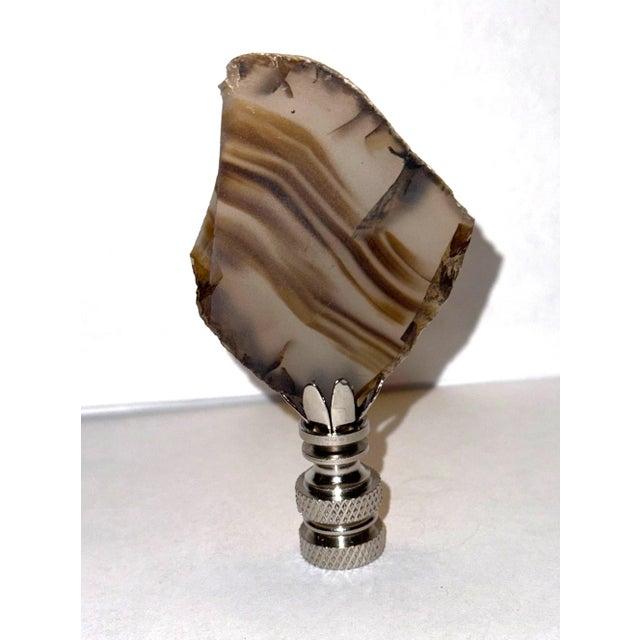 Add a bit of drama and flair to your lamp with this striped flint stone finial Natural stone secured with epoxy resin to a...
