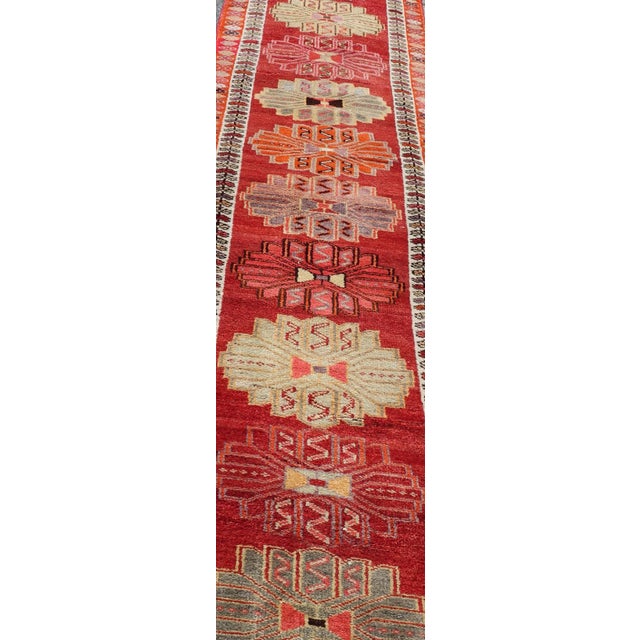 Measures: 2'11 x 15'0 Vintage Turkish Oushak Runner with Bright and Colorful Large Medallion Design. Keivan Woven Arts /...