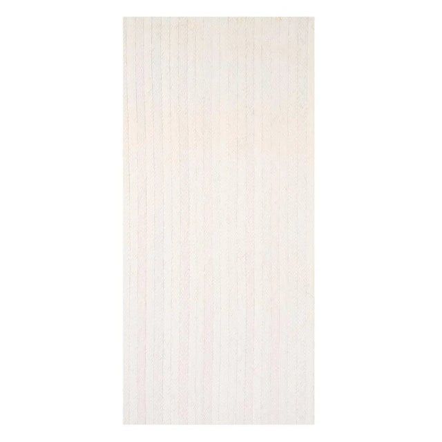 Braided Buri wallcovering effortlessly channels laid-back, beach bungalow style with subtle stripes of hand-braided buri...