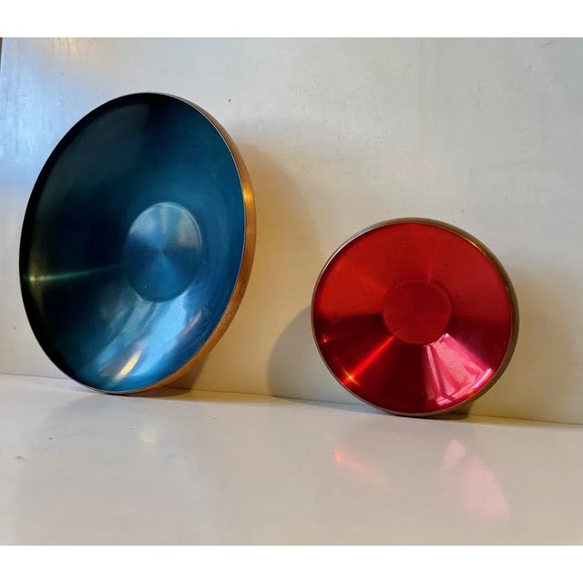 Danish Modernist solid Copper Bowls with interior red and petrol-blue enamel. Manufactured and designed by Corona in...