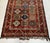 A vintage Caucasian Soumak — a collectible flatweave built by wrapping colored wefts rather than knotting — carrying three...