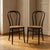 Pair of bentwood chairs with black lacquered beech frames and Vienna straw seats, Herbatschek series, produced at a former...