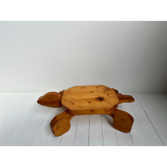 Vintage handmade and stamped K.M., rustic pine folk art turtle plant stand. This large turtle is very sturdy and can hold...