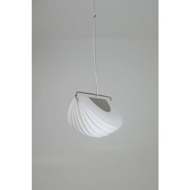 Pendant lamp model 'Spicchio', designed by Ermanno Lampa and Sergio Brazzoli for Guzzini, Italy, 1970s. The lamp consists...