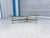 Mid-century walnut and brass freeform glass coffee table, designed and manufactured in the United States, circa 1960s....