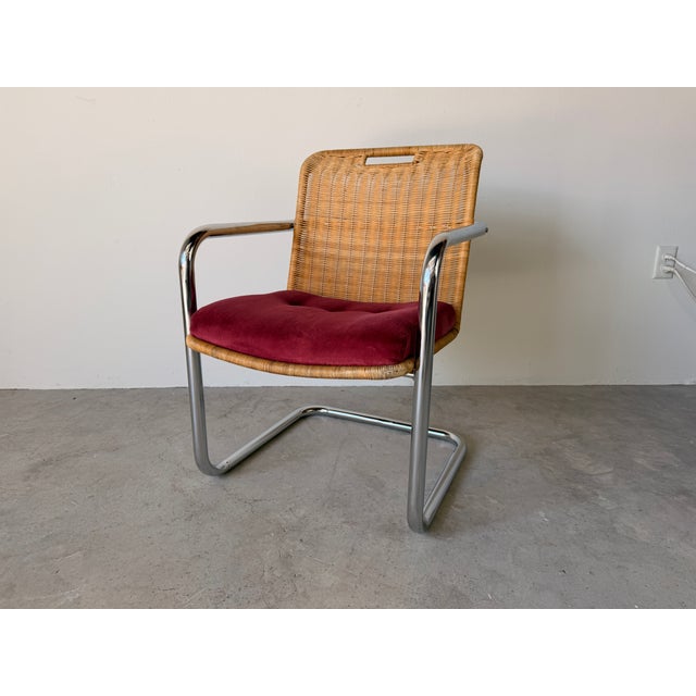 A striking Chair of Harvey Probber style Chromcraft dining armchairs showcasing iconic Mid Century Modern design....