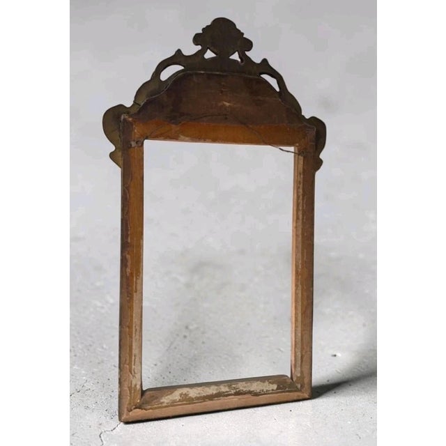 A substantial antique frame with real presence, this one dates to roughly the late 1890s through early 1900s, based on its...