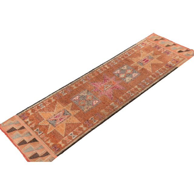 Hand-knotted in wool, a 3x11 runner from Rug & Kilim’s newest curation of extremely collectible tribal pieces. Originating...