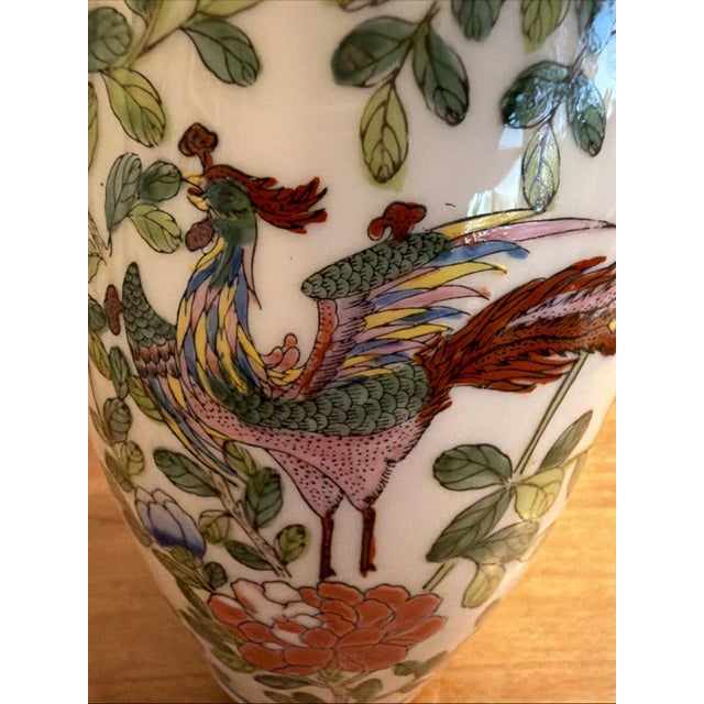 Beautiful hand-painted Chinese export porcelain vase featuring a phoenix (fenghuang) amid peonies and foliage. Decorated...