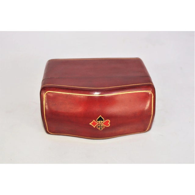 New Italian hand-crafted leather box for playing cards. On top is embossed the four playing card suits along with a gold...