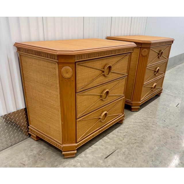 Bring effortless coastal sophistication to your home with this stunning pair of vintage Kosuga split reed and rattan side...