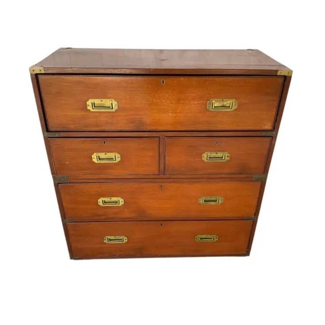Handsome Campaign Chest constructed in two sections for ease of transport and fitted with classic brass hardware. The...