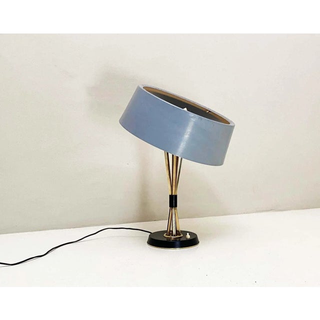 Mod. 476 designed by the Italian designer Oscar Torlasco. The metal and brass hat is adjustable. Hat tends more to gray...