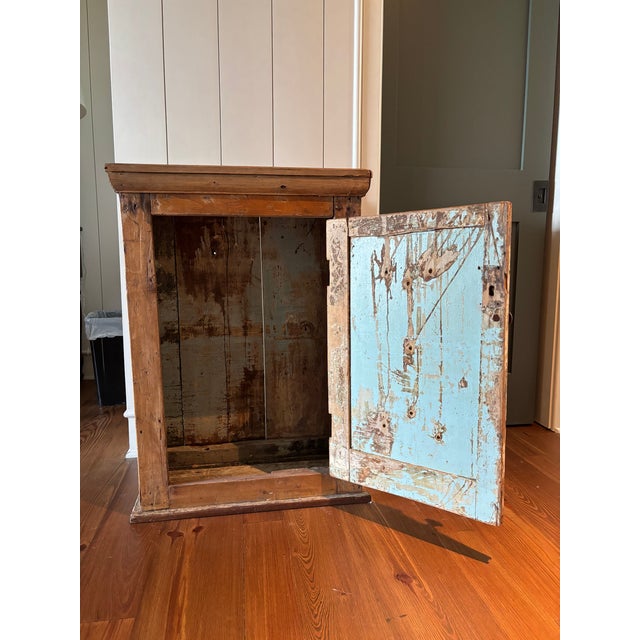 Charming antique pine primitive hanging cabinet with scallop detail, molded cornice and traces of original pale blue...