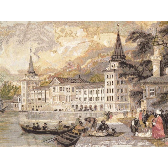 Flemish wall tapestry was woven on a large scale from wool with muted earth tones into a lavish landscape composition that...