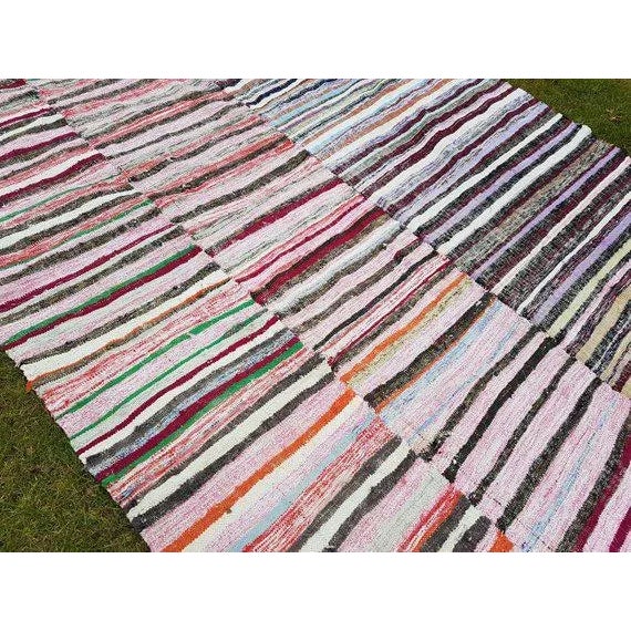 This is a vintage handwoven cotton and goat hair rug from Turkey. The piece was made in the 1970s.