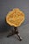 Victorian Black Forest style occasional table featuring a shaped walnut top with satinwood marquetry inlay. The top is...