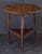 A handsome English cricket table of patinated oak from the Georgian Era, featuring the traditional round or circular top...