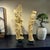 A Pair of carved bone or ivory-like resin figurines depicting Shou Xing (God of Longevity) and Guanyin (female immortal).