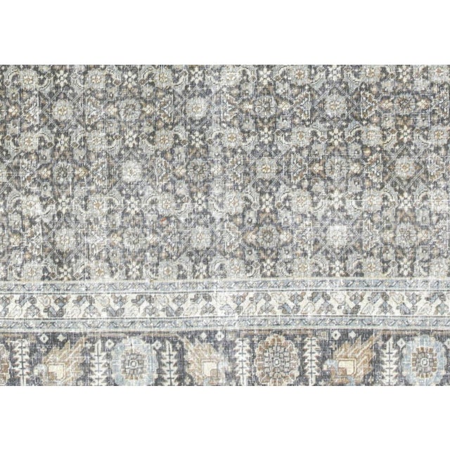 This lavish hand-knotted Persian Tabriz rug adds the perfect touch of elegance to any space. Its intricate design features...