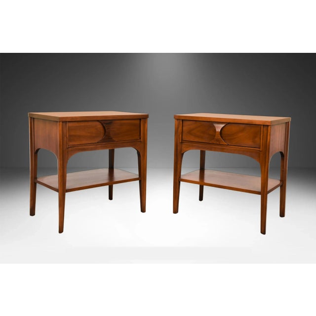 Mid-century Modern rosewood and pecan nightstands by Kent Coffey, from their sought after Perspecta collection. Minimalist...