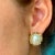 This is part of Chairish’s Fine Jewelry assortment. A fine pair of vintage 14K gold Mabe pearl and diamond earrings. The...