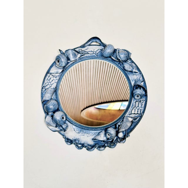 An exceptional ceramic wall mirror from Ulli Wittich-Großkurth's experimental period. The sculpted frame, with its...